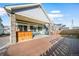 The backyard patio provides a beautiful view with an outdoor seating area at 26310 E 3Rd Pl, Aurora, CO 80018