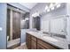 Bathroom with double vanity and large shower at 26310 E 3Rd Pl, Aurora, CO 80018