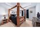 Bedroom with log frame bed and side tables at 26310 E 3Rd Pl, Aurora, CO 80018