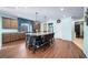 Stylish kitchen island with seating for dining and entertaining, plus ample counter space at 26310 E 3Rd Pl, Aurora, CO 80018