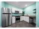 Stylish kitchen featuring stainless steel appliances and ample counter space at 26310 E 3Rd Pl, Aurora, CO 80018