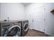 Laundry room with washer and dryer units at 26310 E 3Rd Pl, Aurora, CO 80018