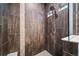 Walk-in shower with tile walls and shower head at 26310 E 3Rd Pl, Aurora, CO 80018