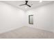 Bright bedroom offers neutral carpet, recessed lighting and a single window at 1823 W 35Th Ave, Denver, CO 80211