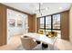 Spacious home office featuring wood paneling, and modern light fixture at 1823 W 35Th Ave, Denver, CO 80211