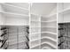 Spacious walk-in closet with custom shelving and storage solutions for organization at 1823 W 35Th Ave, Denver, CO 80211