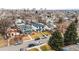 Aerial view of a neighborhood showcasing a modern home with well-maintained landscaping and curb appeal at 1518 S Columbine St, Denver, CO 80210