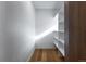 Walk-in closet featuring hardwood floors and modern white shelving at 1518 S Columbine St, Denver, CO 80210