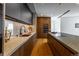 Modern kitchen with wood and dark cabinetry, marble countertops at 1518 S Columbine St, Denver, CO 80210