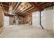 Unfinished basement with concrete floor, exposed beams and mechanical systems ready for your design ideas at 6514 Agave Ave, Castle Rock, CO 80108