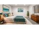 Inviting bedroom showcasing modern decor, with a comfortable bed, stylish furnishings, and natural light at 6514 Agave Ave, Castle Rock, CO 80108