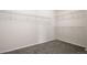 Walk in closet with carpet and metal racks ready for your organizing needs at 6514 Agave Ave, Castle Rock, CO 80108