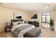 Bright bedroom with a large window, modern decor, and stylish furnishings at 800 N Pearl St # 702, Denver, CO 80203
