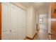 Entryway featuring coat closet and tile flooring leading into an open floor plan at 800 N Pearl St # 702, Denver, CO 80203