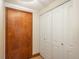 Entryway with closet and solid wood door, offering practicality and storage as you enter at 800 N Pearl St # 702, Denver, CO 80203