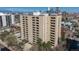 View of a high rise condo building in the city with a tennis court at 800 N Pearl St # 702, Denver, CO 80203