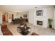 Spacious living room features a fireplace, plush carpet, and ample natural light at 800 N Pearl St # 702, Denver, CO 80203