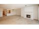 Large living room featuring a fireplace and dining area with pendant lighting at 800 N Pearl St # 702, Denver, CO 80203