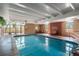 Resident pool room with pool, seating, and outside views at 800 N Pearl St # 702, Denver, CO 80203