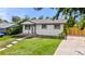 Beautiful home with a well-manicured lawn, updated paint, and an inviting front entrance at 871 S Worchester St, Aurora, CO 80012