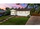 Inviting single-story home showcasing a walkway and a well-maintained front yard at 871 S Worchester St, Aurora, CO 80012