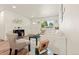 Spacious living room features hardwood floors, lots of natural light, and an open floor plan at 871 S Worchester St, Aurora, CO 80012
