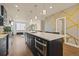 Contemporary kitchen with a large island, open layout, and stylish finishes at 1336 Sheridan Blvd # 108, Denver, CO 80214