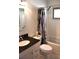 This bathroom features a tub with shower, granite counters, and a sink with brushed metal faucet at 10759 Ogden St, Northglenn, CO 80233