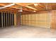 Spacious garage with overhead lighting and unfinished walls at 10759 Ogden St, Northglenn, CO 80233