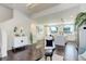 Open floor plan seamlessly connects the living room to the kitchen with a large island at 9180 E 52Nd Dr, Denver, CO 80238