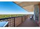 This balcony offers panoramic views and a shaded area for relaxing outdoors at 4570 E Yale Ave # 1004, Denver, CO 80222
