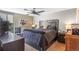 A beautifully decorated bedroom features a large bed and elegant furnishings at 4570 E Yale Ave # 1004, Denver, CO 80222