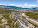 Expansive aerial scene of a mountain community showcasing homes, roads, and beautiful natural scenery at 10 River Park Dr # A, Breckenridge, CO 80424