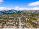 Scenic aerial view of a mountain town with snow-capped peaks in the background on a clear, sunny day at 10 River Park Dr # A, Breckenridge, CO 80424
