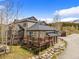 Aerial view of the exterior with deck and beautiful landscaping, blending with the natural surroundings at 10 River Park Dr # A, Breckenridge, CO 80424