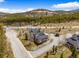 View of home exterior with a private driveway and outdoor landscape in a beautiful mountain environment at 10 River Park Dr # A, Breckenridge, CO 80424