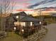 Beautiful mountain home with a spacious deck, perfect for enjoying the surrounding natural beauty at sunset at 10 River Park Dr # A, Breckenridge, CO 80424