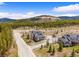 Picturesque home featuring a private driveway and a scenic wooded backdrop, showcasing a tranquil mountain neighborhood at 10 River Park Dr # A, Breckenridge, CO 80424