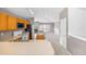 Functional kitchen with an open layout connecting to a living area featuring a fireplace and deck access at 10 River Park Dr # A, Breckenridge, CO 80424