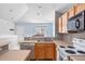 Kitchen with wooden cabinets and breakfast bar at 10 River Park Dr # A, Breckenridge, CO 80424
