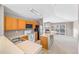 Functional kitchen with wood cabinets, essential appliances, and an open layout leading to the living area at 10 River Park Dr # A, Breckenridge, CO 80424