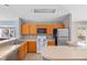 Bright kitchen features stainless steel refrigerator, wooden cabinetry and breakfast bar at 10 River Park Dr # A, Breckenridge, CO 80424