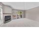 Living room includes a gas fireplace and sliding door to a deck at 10 River Park Dr # A, Breckenridge, CO 80424