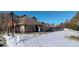 Community pool house and surrounding area with a snowy landscape at 12844 King St, Broomfield, CO 80020