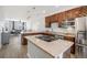 Modern kitchen with stainless steel appliances and granite countertops at 12844 King St, Broomfield, CO 80020