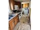 Kitchen featuring stainless steel appliances and light brown cabinets at 1130 Orchard St, Golden, CO 80401