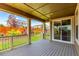 Relaxing covered patio with ample space, perfect for outdoor dining and entertaining guests at 16321 Clayton St, Thornton, CO 80602