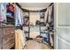 Organized walk in closet with custom shelving and storage solutions at 7203 W Pacific Ave, Lakewood, CO 80227