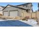 Contemporary home with a well-maintained yard, two-car garage, and privacy fence at 7203 W Pacific Ave, Lakewood, CO 80227