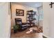 Home office with leather recliner, bookcase, and hardwood floors at 7203 W Pacific Ave, Lakewood, CO 80227
